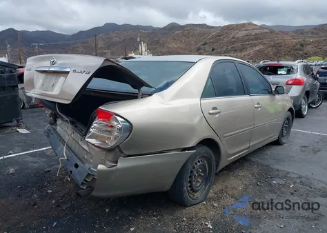 2002 Toyota Camry Le from USA, damaged, VIN 4T1BE32K22U512361